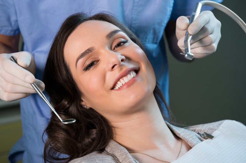 woman smiling during dental checkup